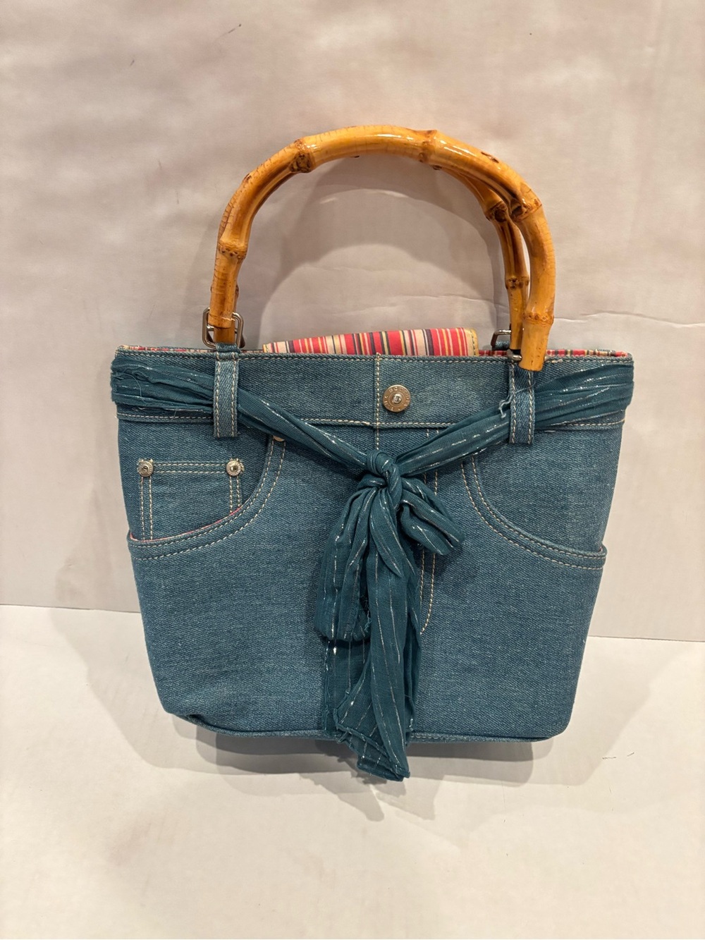 Bottega Blu 
Blue Denim Tote with Bamboo Handles and Tie Accent